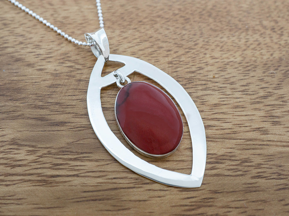 Red Jasper Oval in Elliptical Frame