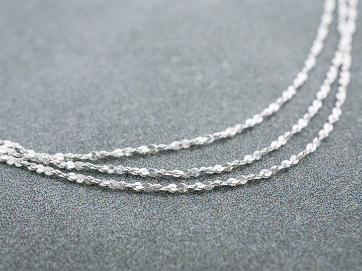 A dainty sterling silver rope cut chain.