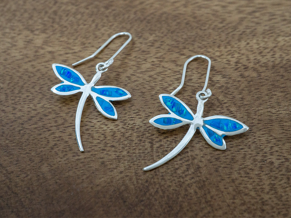 sterling silver dragonfly earrings. the open wings are filled in with blue enamel and blue opal chips.