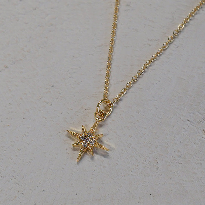 Dainty gold-filled necklace with a pave-style star pendant.