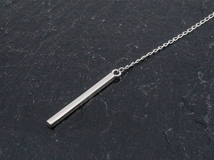 Sterling silver lariat necklace with an 8" drop and pendulum dangle.