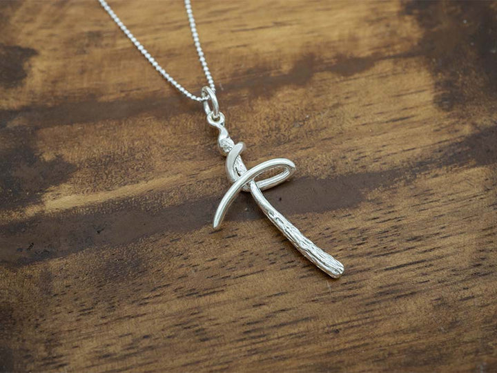 Textured Swirl Cross Pendant