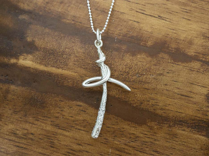 Textured Swirl Cross Pendant
