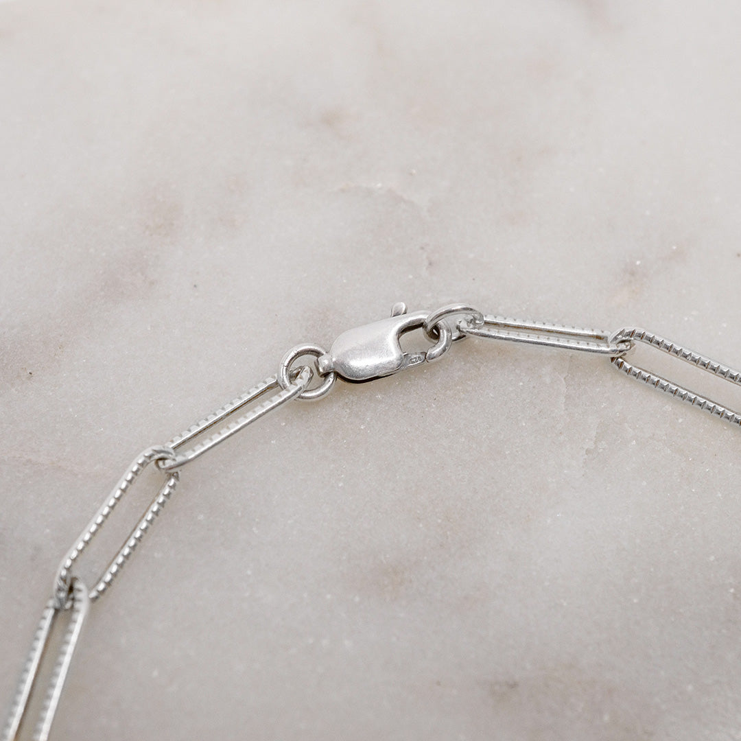 Signs and Symbols Mixed Metals Charm Necklace