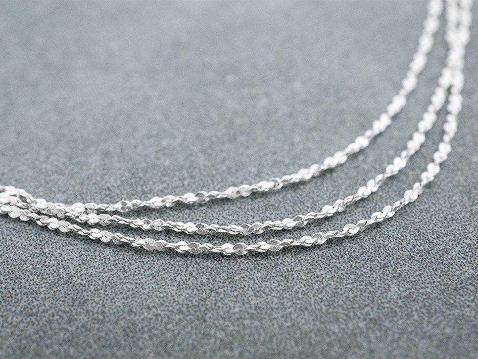 A dainty sterling silver rope cut chain.