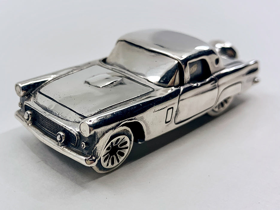 Sterling silver die-cast model of a 1956 Ford Thunderbird.