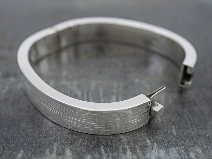 Hinged Oval Bangle w/ Raked Finish