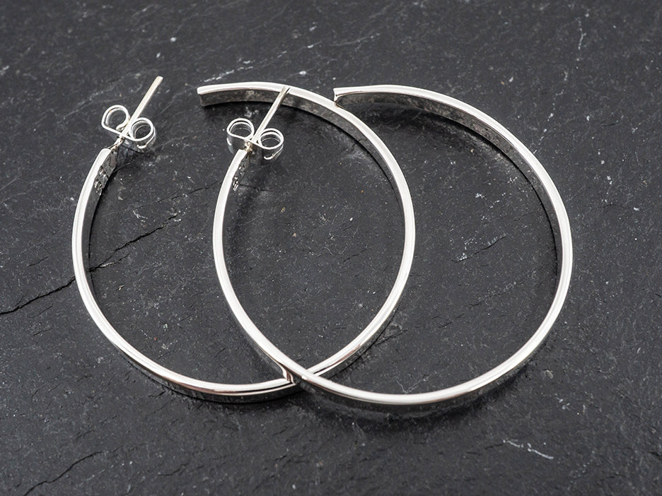Sterling silver hoop earrings. 