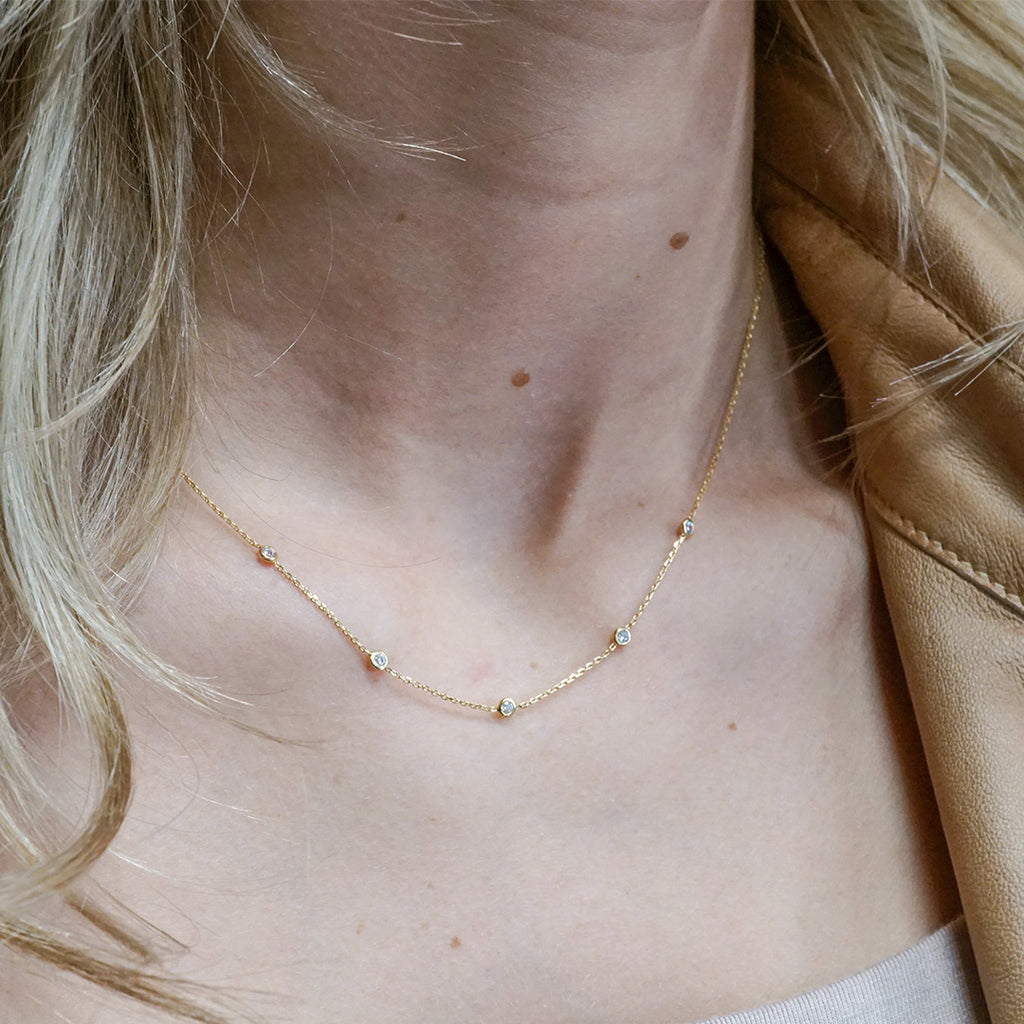 Dainty gold-filled necklace with cubic zirconia beads.  