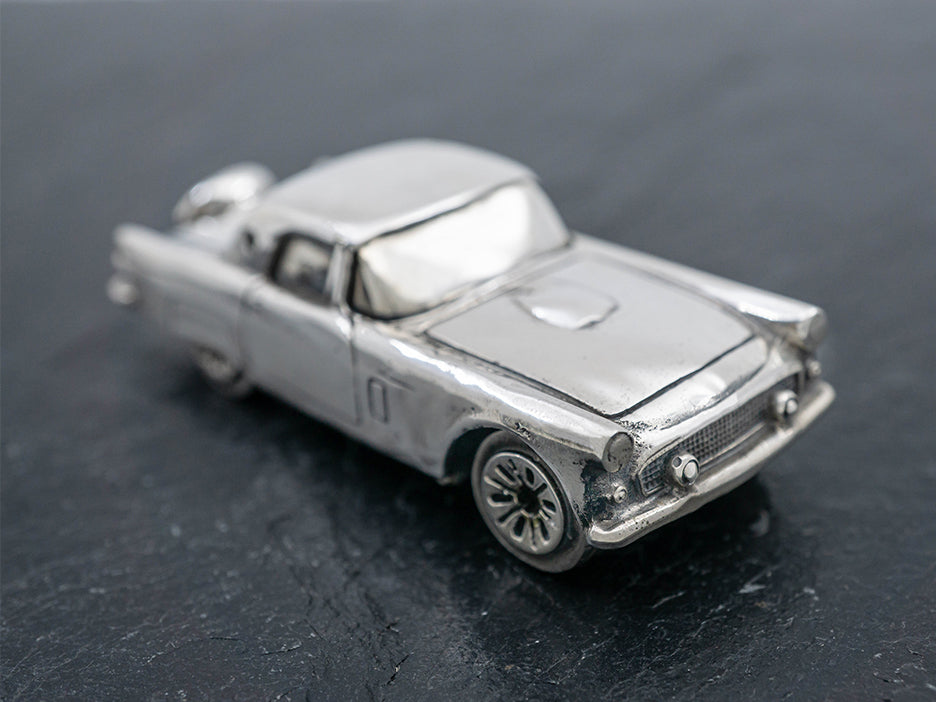 Sterling silver die-cast model of a 1956 Ford Thunderbird.