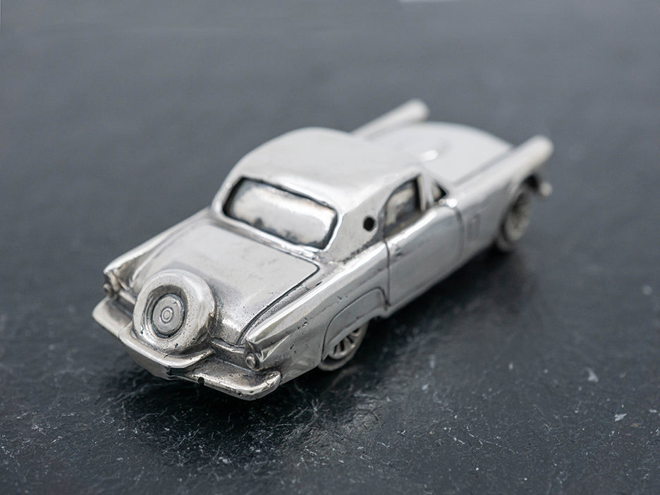 Sterling silver die-cast model of a 1956 Ford Thunderbird.