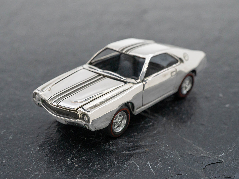 A sterling silver die-cast model of a 1968 AMX.