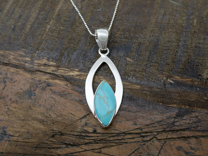 Turquoise Marquise Stone In Ribbon