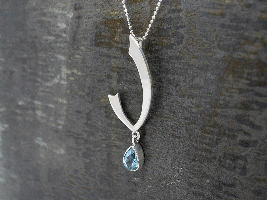 Swoop Pendant w/ Blue Topaz Teardrop