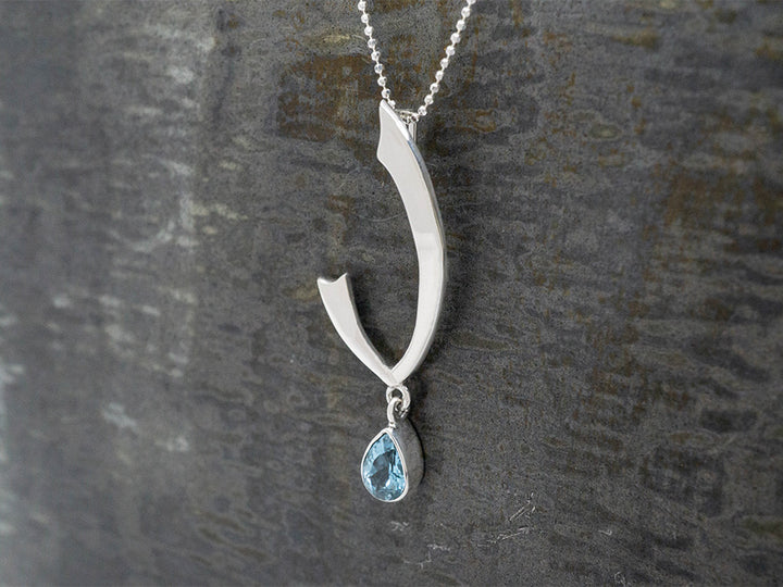 Swoop Pendant w/ Blue Topaz Teardrop